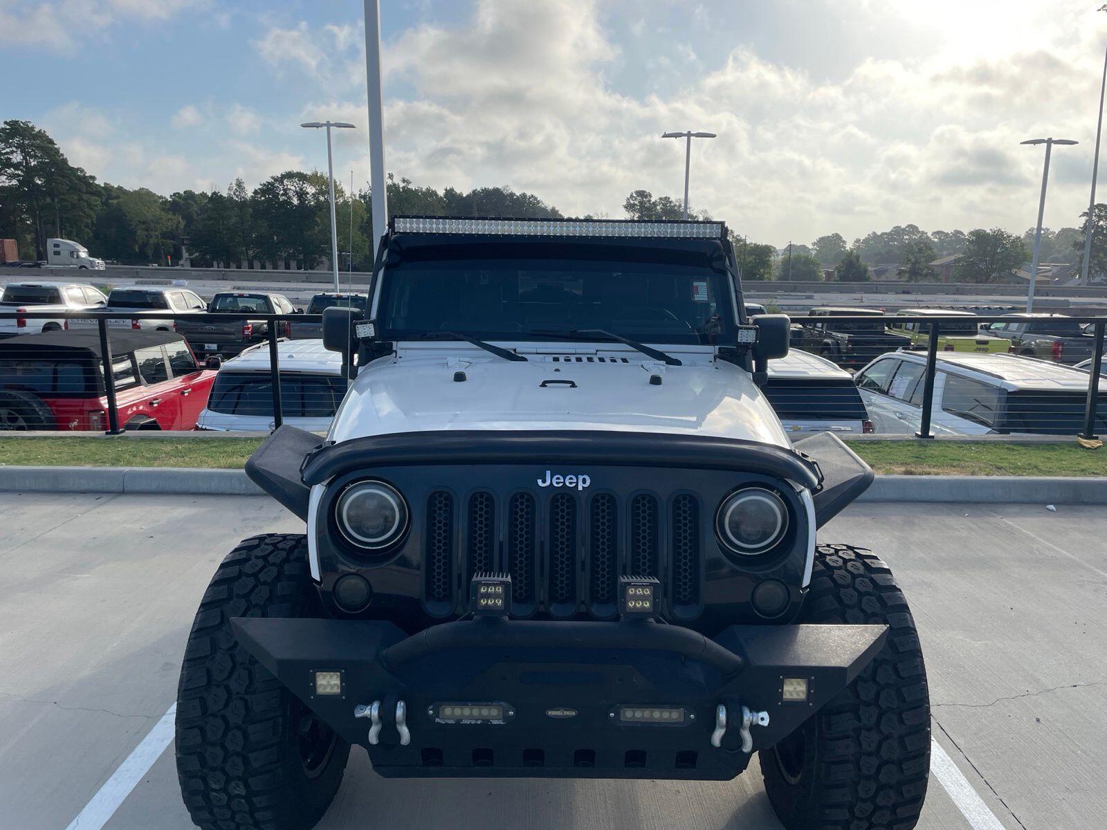 Used 2009 Jeep Wrangler X with VIN 1J4FA24189L727172 for sale in Huntsville, TX