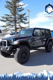 2025 Jeep Wrangler  in a PPS Fathom Blue Pearl Coat exterior color and VLX9interior. Rocky Mountain Yeti Jackson Hole 307-733-5337 rockymountainyetijacksonhole.com 