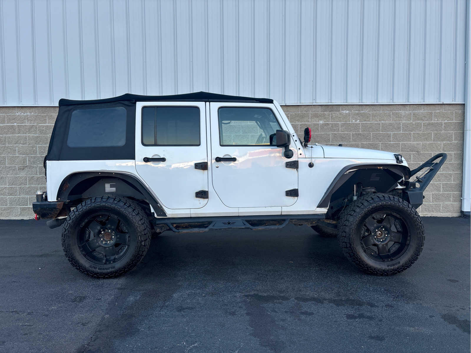 Used 2014 Jeep Wrangler Unlimited Sport with VIN 1C4BJWDG9EL207668 for sale in Wilmington, OH