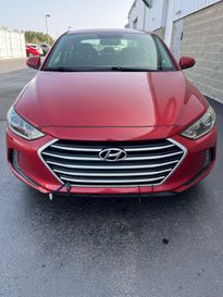 2017 Hyundai Elantra Value Edition in a Scarlet Red exterior color and Blackinterior. Wilmington Auto Center Chrysler Dodge Jeep Ram (937) 556-6430 wilmingtonautocentercdjr.com 