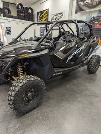 2022 Polaris RZR Pro XP 4 Ultimate in a Black Crystal/Gold exterior color. Mettler Implement mettlerimplement.com 