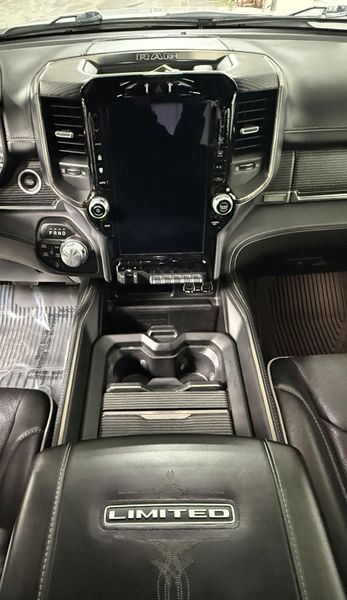 Used 2020 RAM 1500 Limited in a Ivory White Tri Coat Pearl Coat exterior color and Blackinterior. Thys Motor Company 319-318-6640 thysmotorco.com 