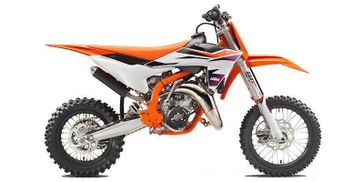 2024 KTM SX 50 in a ORANGE exterior color. New England Powersports 978 338-8990 pixelmotiondemo.com 