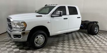 2024 RAM 3500 Tradesman Crew Cab Chassis 4x4 60' Ca in a Bright White Clear Coat exterior color and Diesel Gray/Blackinterior. Fontana Chrysler Dodge Jeep RAM (909) 675-1186 fontanacdjr.com 