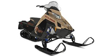 2024 Polaris Switchback Assault in a Gloss Black/Military Tan/Orange Burst exterior color. New England Powersports 978 338-8990 pixelmotiondemo.com 