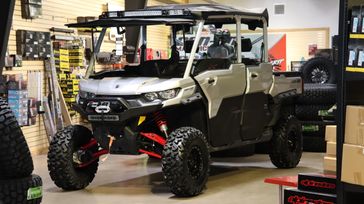 2024 CAN-AM SSV DEF MAX XMR 65 HD10 GY 24 in a SILVER-RED exterior color. Family PowerSports (877) 886-1997 familypowersports.com 