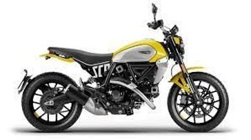 2023 Ducati Scrambler Icon   in a yellow exterior color. Motoworks Chicago 312-738-4269 motoworkschicago.com 