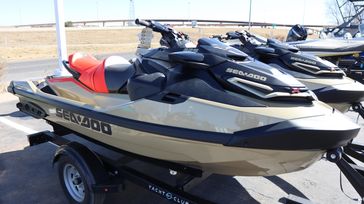 2025 SEADOO RXTX 325 WITH SOUND SYSTEM METALLIC TAN AND LAVA RED 