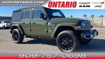 2024 Jeep Wrangler 4xE Sahara in a Sarge Green Clear Coat exterior color and Blackinterior. Ontario Auto Center ontarioautocenter.com 