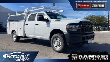 2024 RAM 3500 Tradesman Crew Cab Chassis 4x4 60' Ca in a Bright White Clear Coat exterior color and Diesel Gray/Blackinterior. Victorville Motors Chrysler Jeep Dodge RAM Fiat 760-513-6916 victorvillemotors.com 