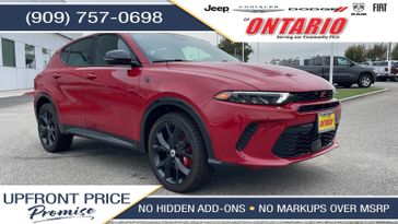 2024 Dodge Hornet R/T in a Hot Tamale exterior color and Blackinterior. Ontario Auto Center ontarioautocenter.com 