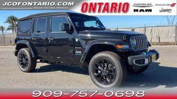 2024 Jeep Wrangler 4xE Sahara in a Black Clear Coat exterior color and Blackinterior. Ontario Auto Center ontarioautocenter.com 