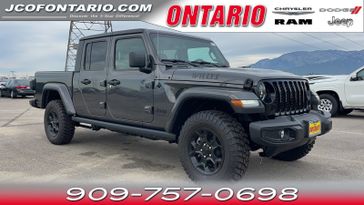 2023 Jeep Gladiator Willys in a Granite Crystal Metallic Clear Coat exterior color and Blackinterior. Ontario Auto Center ontarioautocenter.com 