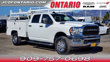 2023 RAM 2500 Tradesman in a Bright White Clear Coat exterior color and Diesel Gray/Blackinterior. Ontario Auto Center ontarioautocenter.com 