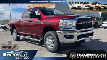 2024 RAM 2500 Big Horn Crew Cab 4x4 6'4' Box in a Delmonico Red Pearl Coat exterior color. Victorville Motors Chrysler Jeep Dodge RAM Fiat 760-513-6916 victorvillemotors.com 