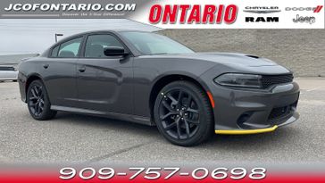 2023 Dodge Charger Gt Rwd in a Granite exterior color and Blackinterior. Jeep Chrysler Dodge RAM FIAT of Ontario 909-757-0698 jcofontario.com 