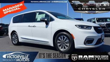 2023 Chrysler Pacifica Plug-in Hybrid Limited in a Bright White Clear Coat exterior color and Black/Alloy/Blackinterior. Victorville Motors Chrysler Jeep Dodge RAM Fiat 760-513-6916 victorvillemotors.com 