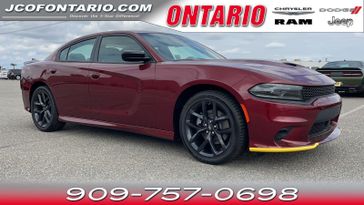 2023 Dodge Charger GT in a Octane Red Pearl Coat exterior color and Blackinterior. Ontario Auto Center ontarioautocenter.com 