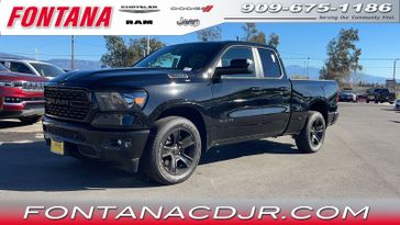 2024 RAM 1500 Big Horn Quad Cab 4x2 6'4' Box in a Diamond Black Crystal Pearl Coat exterior color and Blackinterior. Fontana Chrysler Dodge Jeep RAM (909) 675-1186 fontanacdjr.com 