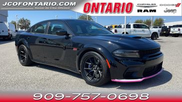 2023 Dodge Charger Scat Pack Widebody in a Pitch Black Clear Coat exterior color and Blackinterior. Ontario Auto Center ontarioautocenter.com 
