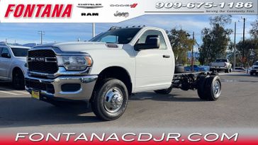 2024 RAM 3500 Chassis Cab Tradesman in a Bright White Clear Coat exterior color and Diesel Gray/Blackinterior. Fontana Chrysler Dodge Jeep RAM (909) 675-1186 fontanacdjr.com 