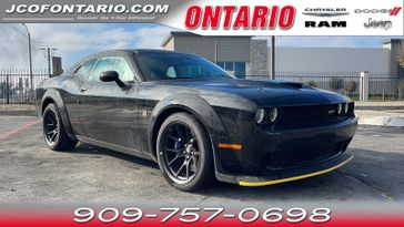 2023 Dodge Challenger R/T Scat Pack Widebody in a Pitch Black Clear Coat exterior color and Blackinterior. Ontario Auto Center ontarioautocenter.com 