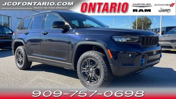 2024 Jeep Grand Cherokee 4xe Trailhawk Carb State Pkg in a Midnight Sky exterior color and Global Blackinterior. Ontario Auto Center ontarioautocenter.com 