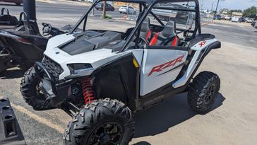 2024 POLARIS RZR XP 1000 SPORT  WHITE LIGHTNING in a WHITE exterior color. Family PowerSports (877) 886-1997 familypowersports.com 