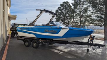 2024 MALIBU MB5472BOAT  in a WHITE/BLUE exterior color. Family PowerSports (877) 886-1997 familypowersports.com 