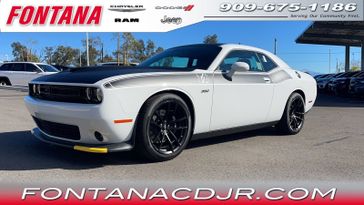 2023 Dodge Challenger R/T Scat Pack in a White Knuckle exterior color and Blackinterior. Fontana Chrysler Dodge Jeep RAM (909) 675-1186 fontanacdjr.com 