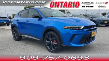 2024 Dodge Hornet R/T in a Blu Bayou exterior color and Blackinterior. Ontario Auto Center ontarioautocenter.com 