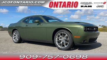 2023 Dodge Challenger SXT in a F8 Green exterior color and Blackinterior. Ontario Auto Center ontarioautocenter.com 