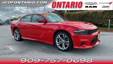 2022 Dodge Charger R/T in a Torred Clear Coat exterior color and Blackinterior. Ontario Auto Center ontarioautocenter.com 