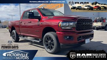 2024 RAM 2500 Big Horn Crew Cab 4x4 6'4' Box in a Delmonico Red Pearl Coat exterior color. Victorville Motors Chrysler Jeep Dodge RAM Fiat 760-513-6916 victorvillemotors.com 