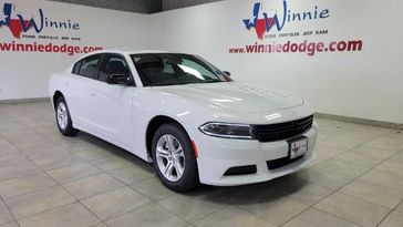 2023 Dodge Charger SXT in a White Knuckle Clear Coat exterior color and Blackinterior. Wnnie Dodge 000-000-0000 pixelmotiondemo.com 