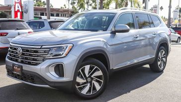 2024 Volkswagen Atlas 2.0T SEL in a Silver Mist Metallic exterior color and French Roast/Blackinterior. BEACH BLVD OF CARS beachblvdofcars.com 