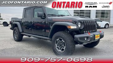 2023 Jeep Gladiator Mojave 4x4 in a Black Clear Coat exterior color and Steel Gray/Global Blackinterior. Jeep Chrysler Dodge RAM FIAT of Ontario 909-757-0698 jcofontario.com 