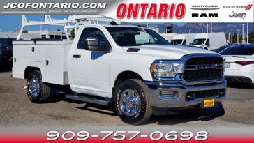 2024 RAM 2500 Tradesman in a Bright White Clear Coat exterior color and Diesel Gray/Blackinterior. Ontario Auto Center ontarioautocenter.com 