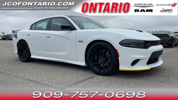 2023 Dodge Charger Scat Pack in a White Knuckle Clear Coat exterior color and Blackinterior. Ontario Auto Center ontarioautocenter.com 