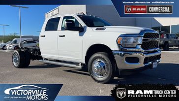 2024 RAM 3500 Tradesman Crew Cab Chassis 4x4 60' Ca in a Bright White Clear Coat exterior color and Blackinterior. Victorville Motors Chrysler Jeep Dodge RAM Fiat 760-513-6916 victorvillemotors.com 