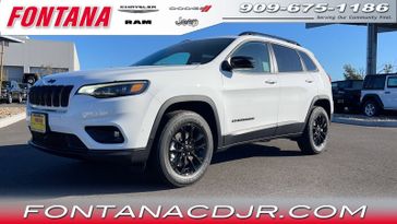 2023 Jeep Cherokee Altitude Lux 4x4 in a Bright White Clear Coat exterior color and Blackinterior. Fontana Chrysler Dodge Jeep RAM (909) 675-1186 fontanacdjr.com 