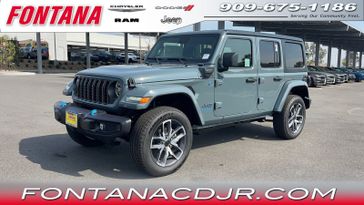 2024 Jeep Wrangler  Sport S 4xe in a Anvil Clear Coat exterior color and Blackinterior. Fontana Chrysler Dodge Jeep RAM (909) 675-1186 fontanacdjr.com 