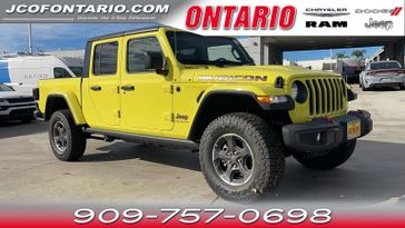 2023 Jeep Gladiator Rubicon 4x4 in a High Velocity Clear Coat exterior color and Blackinterior. Jeep Chrysler Dodge RAM FIAT of Ontario 909-757-0698 jcofontario.com 