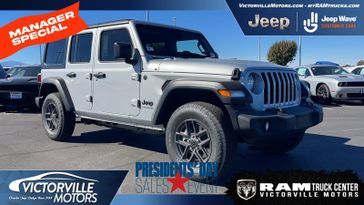 2024 Jeep Wrangler  Sport S in a Silver Zynith Clear Coat exterior color and Blackinterior. Victorville Motors Chrysler Jeep Dodge RAM Fiat 760-513-6916 victorvillemotors.com 
