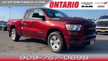 2024 RAM 1500 Big Horn in a Delmonico Red Pearl Coat exterior color and Blackinterior. Ontario Auto Center ontarioautocenter.com 