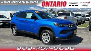 2022 Jeep Compass Sport in a Laser Blue Pearl Coat exterior color and Blackinterior. Jeep Chrysler Dodge RAM FIAT of Ontario 909-757-0698 jcofontario.com 