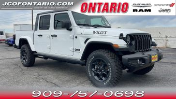 2023 Jeep Gladiator Willys 4x4 in a Bright White Clear Coat exterior color and Blackinterior. Jeep Chrysler Dodge RAM FIAT of Ontario 909-757-0698 jcofontario.com 