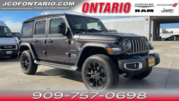 2024 Jeep Wrangler 4xE Sahara in a Granite Crystal Metallic Clear Coat exterior color and Blackinterior. Ontario Auto Center ontarioautocenter.com 