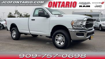 2024 RAM 2500 Tradesman in a Bright White Clear Coat exterior color and Diesel Gray/Blackinterior. Ontario Auto Center ontarioautocenter.com 