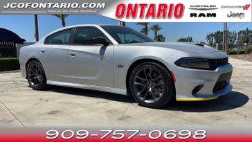 2023 Dodge Charger Scat Pack in a Triple Nickel Clear Coat exterior color and Blackinterior. Ontario Auto Center ontarioautocenter.com 